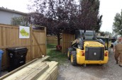 Carnegie Contracting workers are preparing on the renovation project with yellow excavator