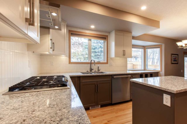 kitchen view showcasing gas hob double sink and windows